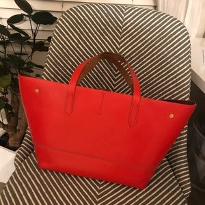 Jcrew leather tote in bright red. Gently used.